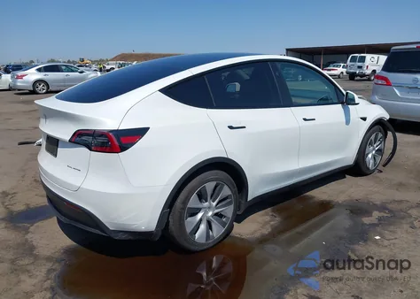2023 Tesla Model Y Awd/Long Range Dual Motor All-Wheel Drive z USA, uszkodzony, nr VIN 7SAYGAEE3PF826073